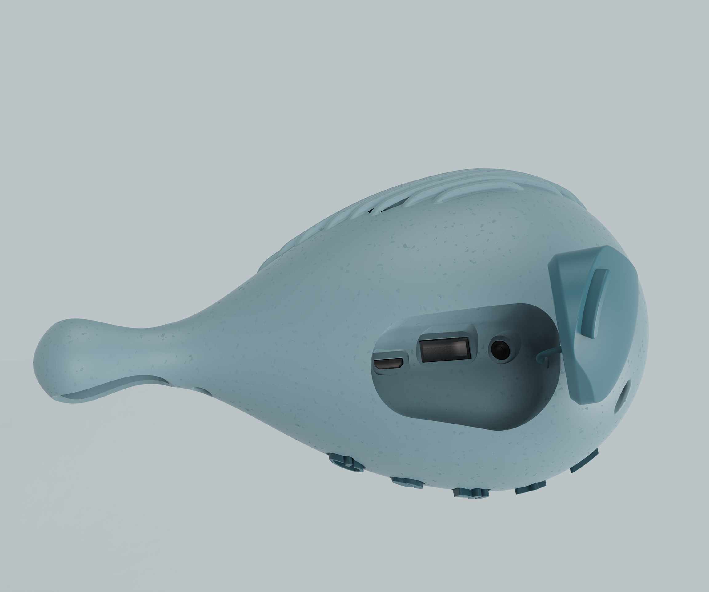 Dropi underside view showing USB-C, USB-A and aux ports inside the hatch bay