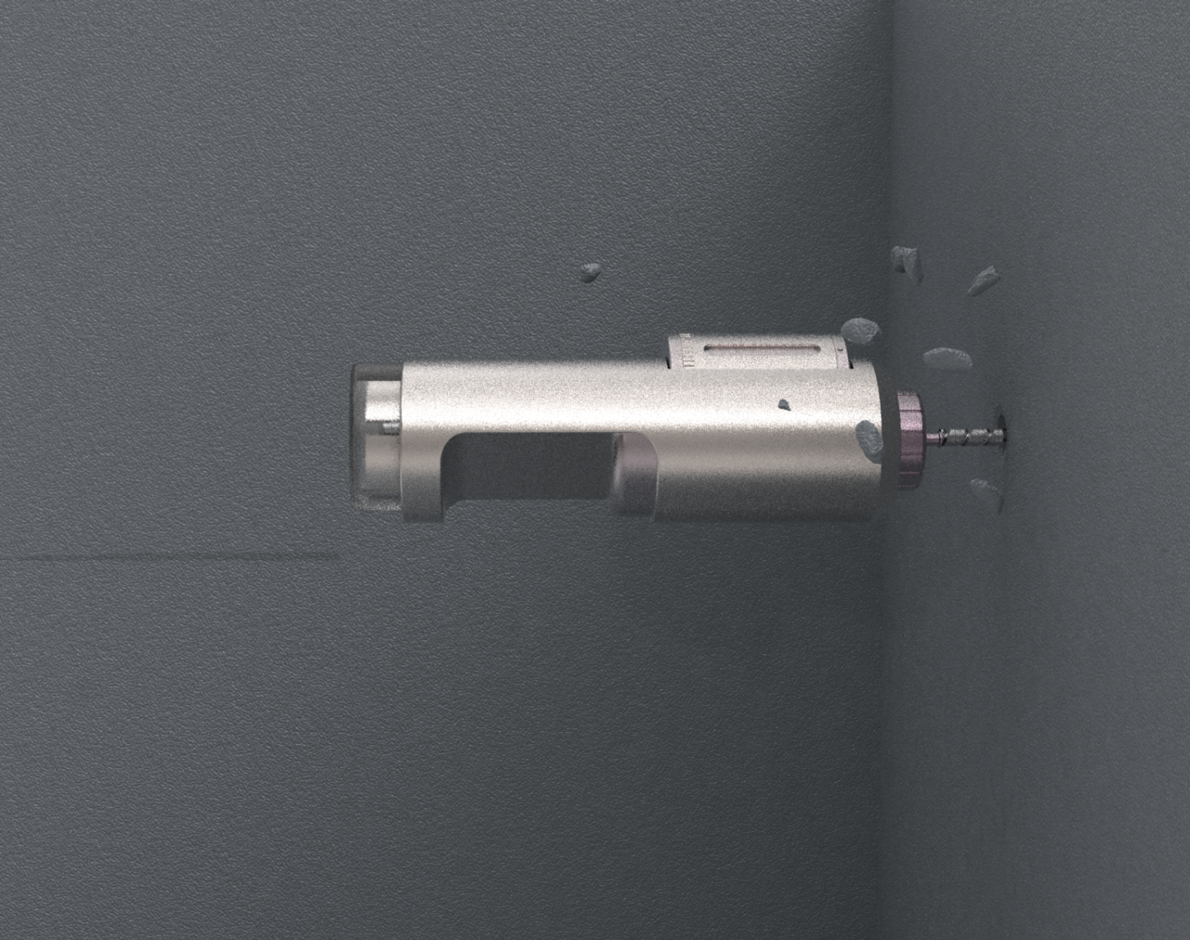 Quill in action, drilling into a grey wall with debris flying out around the bit